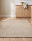 Cozy Willow Brown and Ivory Hand Tufted Wool Rug in a kitchen