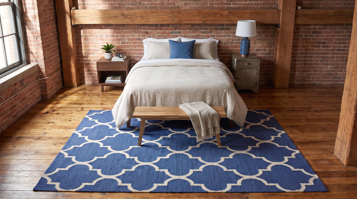 Dazzling Trellis Dark Blue Hand Tufted Wool Rug in a bedroom