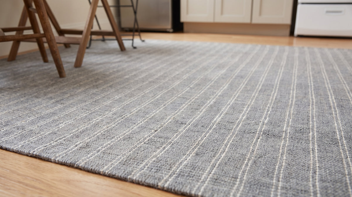 Delicate Giselle Gray Handmade Wool Rug in a kitchen