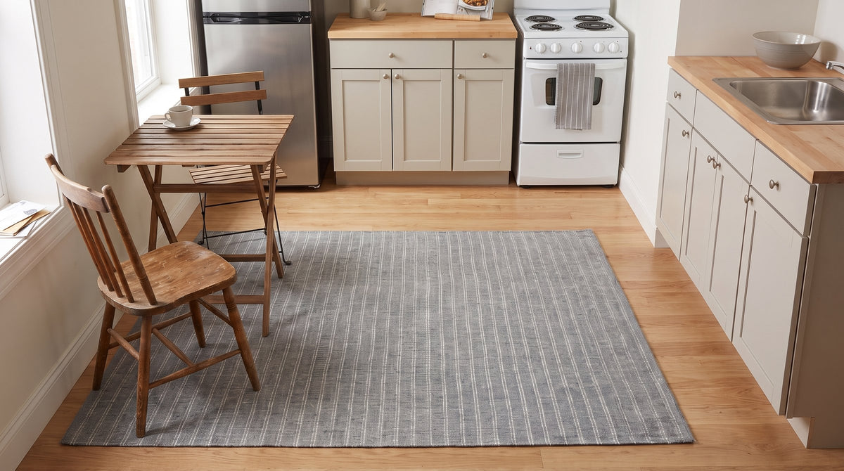 Delicate Giselle Gray Handmade Wool Rug in a kitchen