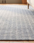 Delicate Giselle Gray Handmade Wool Rug in a sunroom