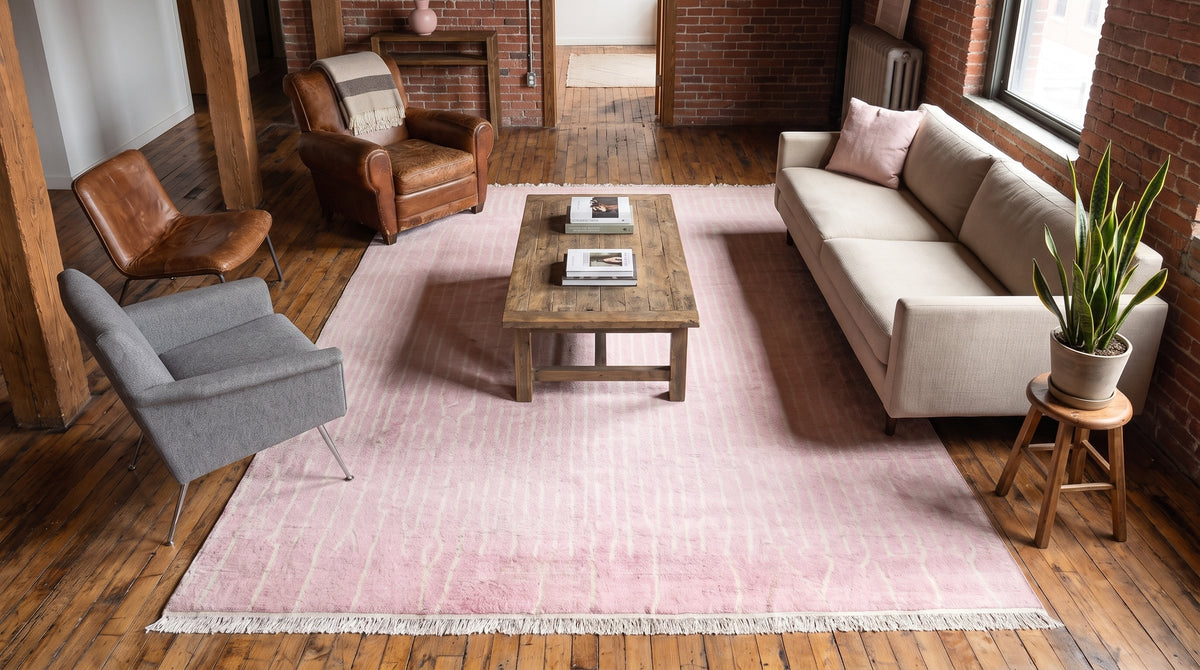 Delicate Moroccan Pink Hand Knotted Wool Rug in a living room