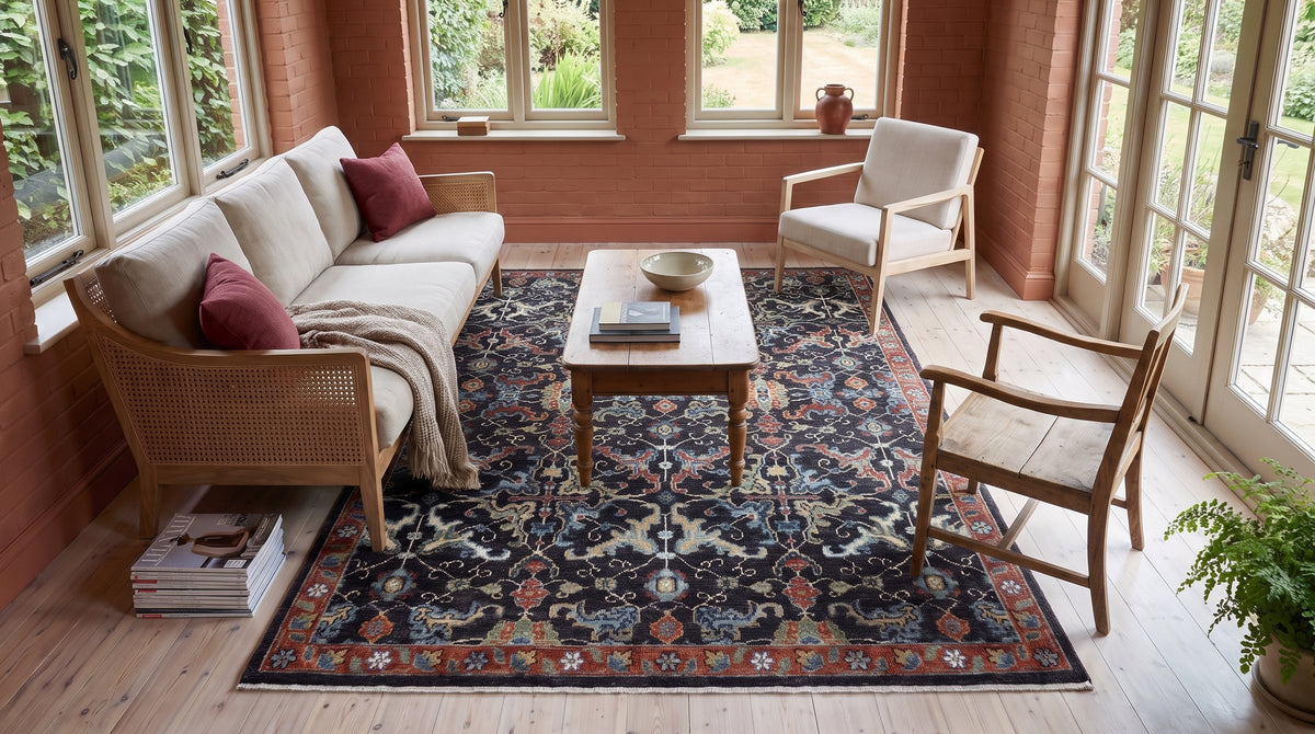 Delicate Oriental Charcoal and Red Hand Knotted Wool Rug in a sunroom