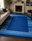 Handloomed Blue Gabbeh Tribal Wool Area Rug in a styled room (2)