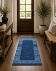 Handloomed Blue Gabbeh Tribal Wool Area Rug in a styled room (4)