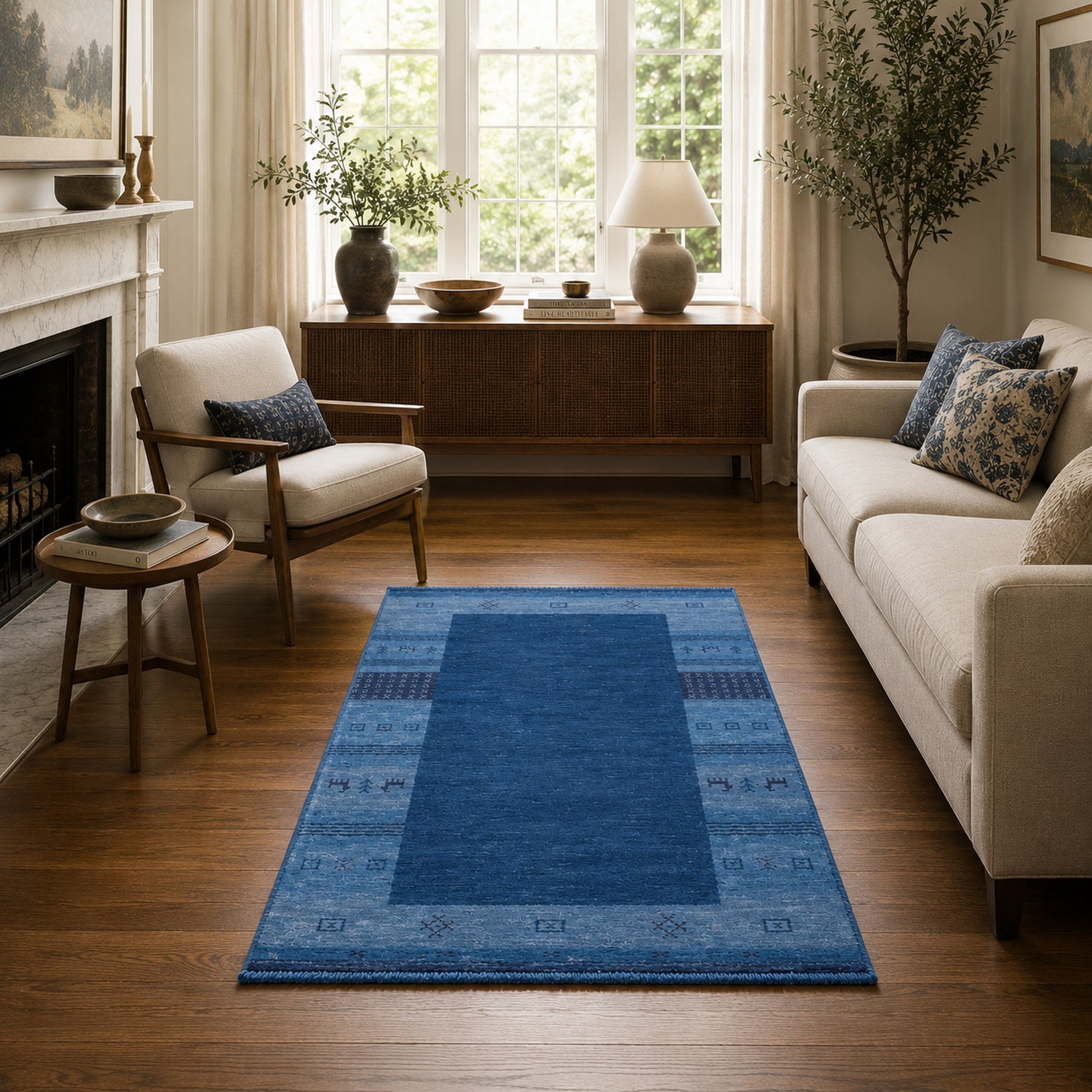 Handloomed Blue Gabbeh Tribal Wool Area Rug in a styled room (5)