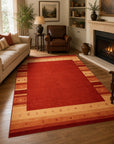 Handloomed Red Gabbeh Tribal Wool Area Rug in a styled room (2)