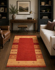 Handloomed Red Gabbeh Tribal Wool Area Rug in a styled room (5)