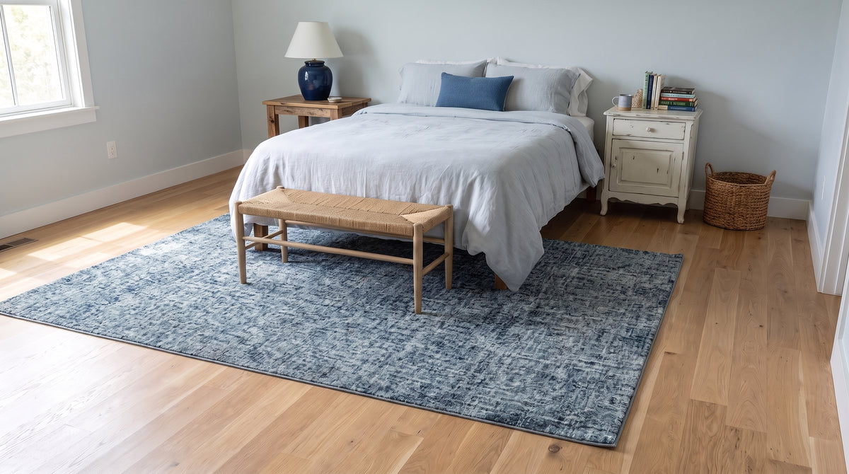 Elena Modern Dark Blue Hand Tufted Wool Rug in a bedroom