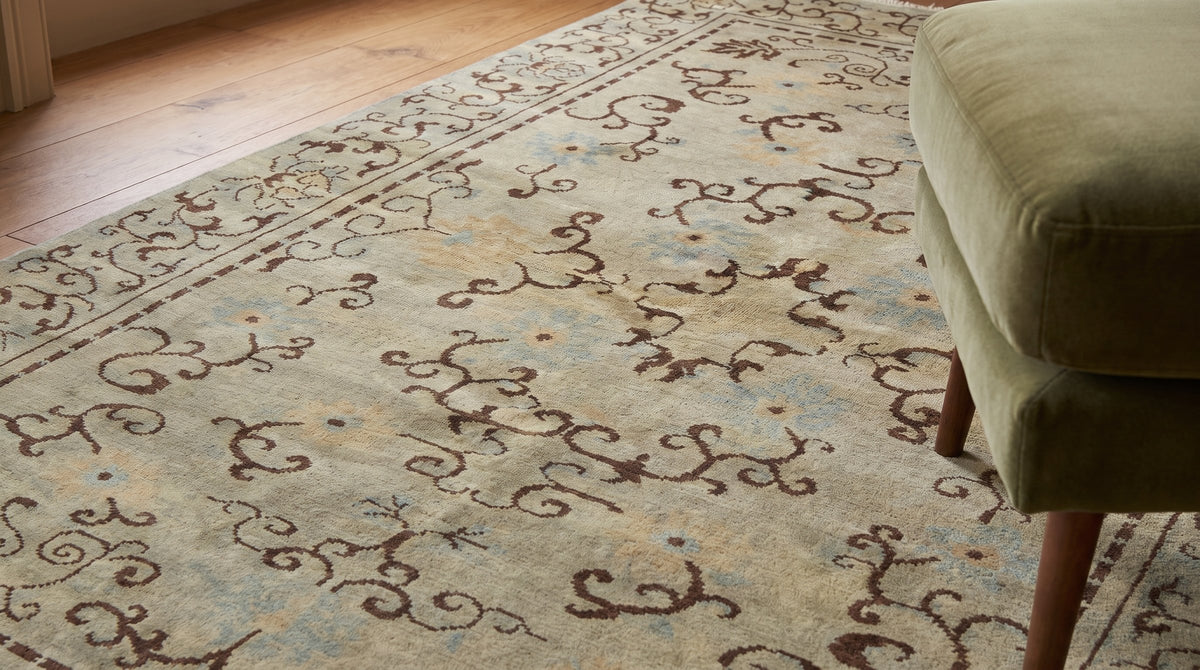 Elena Rustic Green Hand Knotted Wool Rug in a reading nook