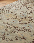 Elena Rustic Green Hand Knotted Wool Rug in a reading nook