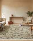 Elena Rustic Green Hand Knotted Wool Rug in a sunroom