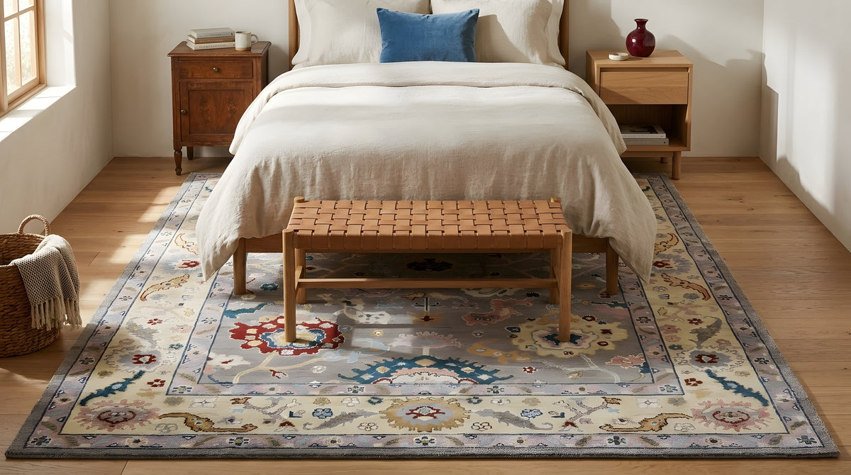 Ella Handcrafted Gray and Gold Hand Knotted Wool Rug in a bedroom