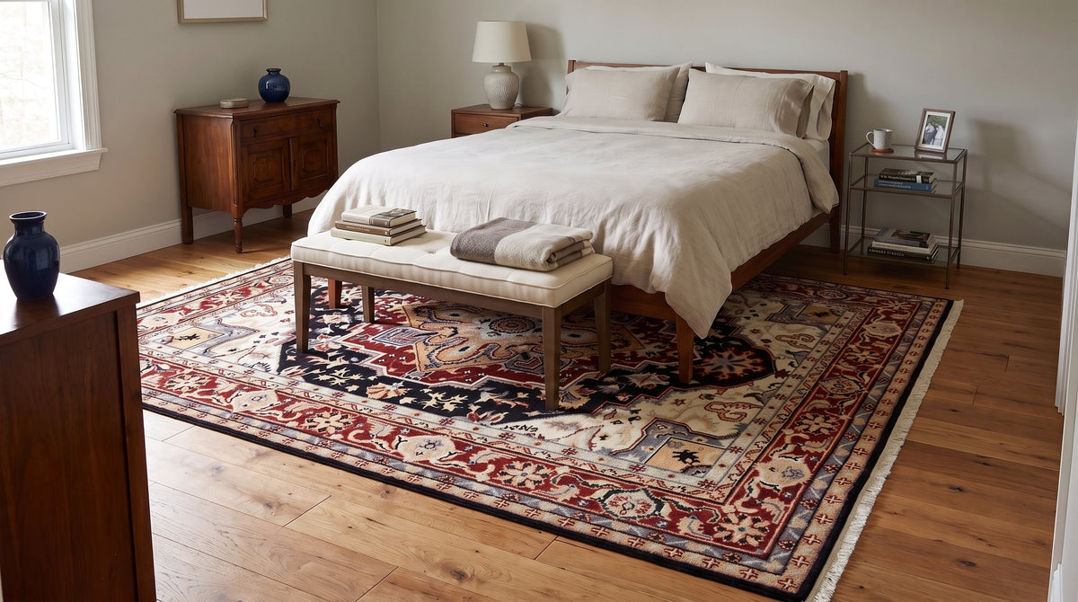Ella Oriental Navy Hand Knotted Wool Rug in a bedroom