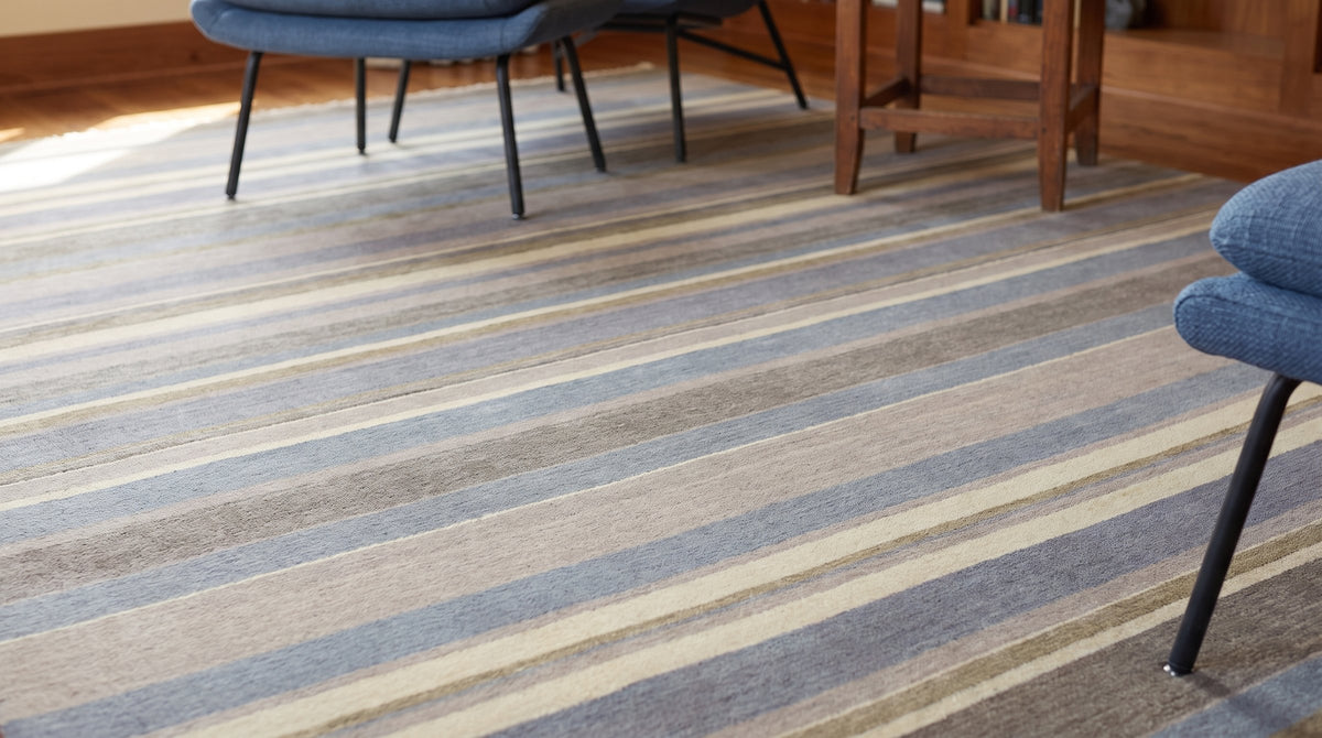 Ella Rustic Brown and Blue Handmade Wool Rug in a reading nook
