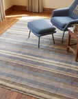 Ella Rustic Brown and Blue Handmade Wool Rug in a reading nook