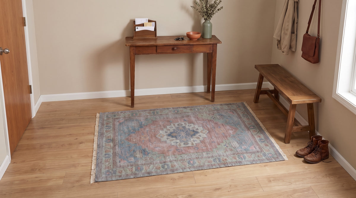 Ember Heritage Blue Handmade Wool Rug in a entryway