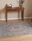 Ember Heritage Blue Handmade Wool Rug in a entryway