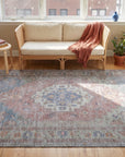 Ember Heritage Blue Handmade Wool Rug in a sunroom