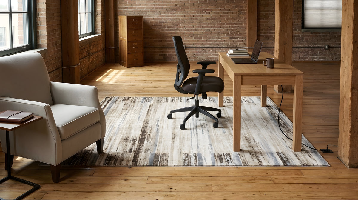 Enchanting Cassandra Ivory Machine-Made Rug in a home office