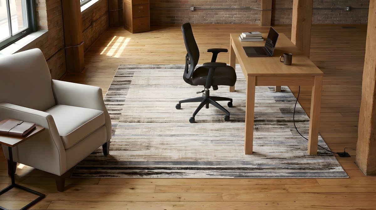 Enchanting Cassandra Ivory Machine-Made Rug in a home office