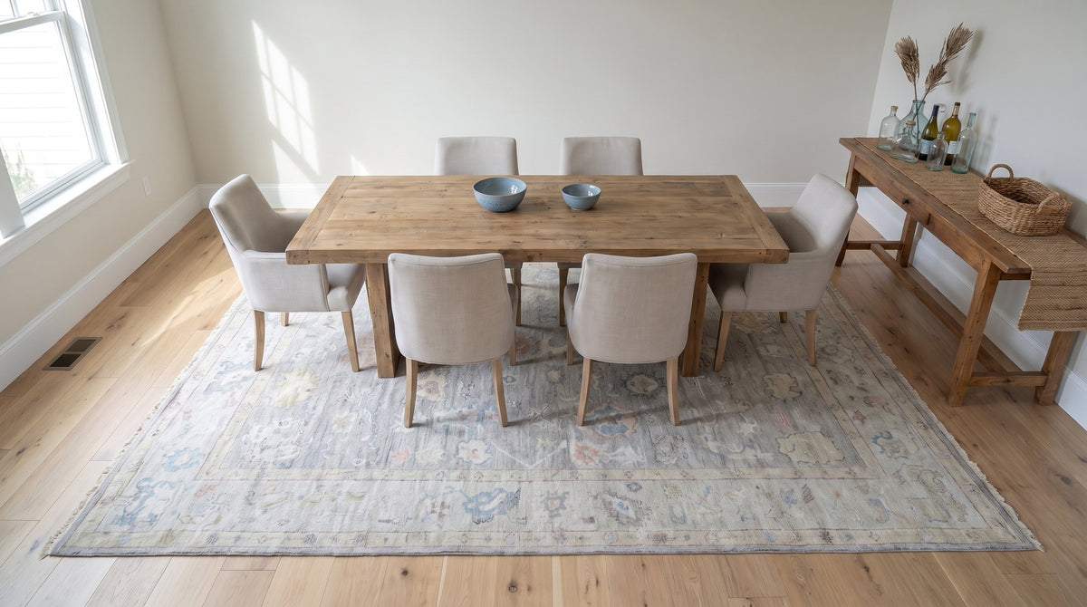 Exquisite Celia Beige Hand Knotted Silk Rug in a dining room