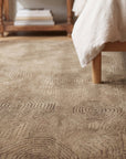 Exquisite Yara Brown Hand Knotted Wool Rug in a bedroom