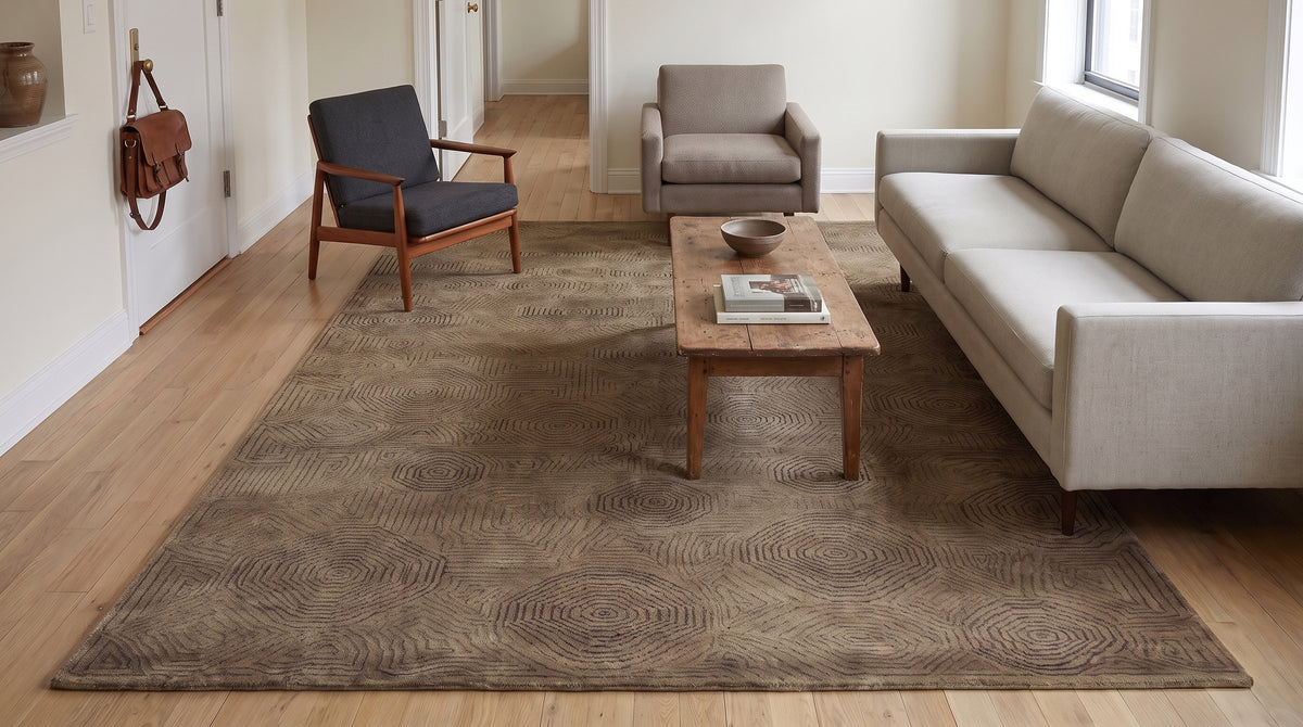 Exquisite Yara Brown Hand Knotted Wool Rug in a living room