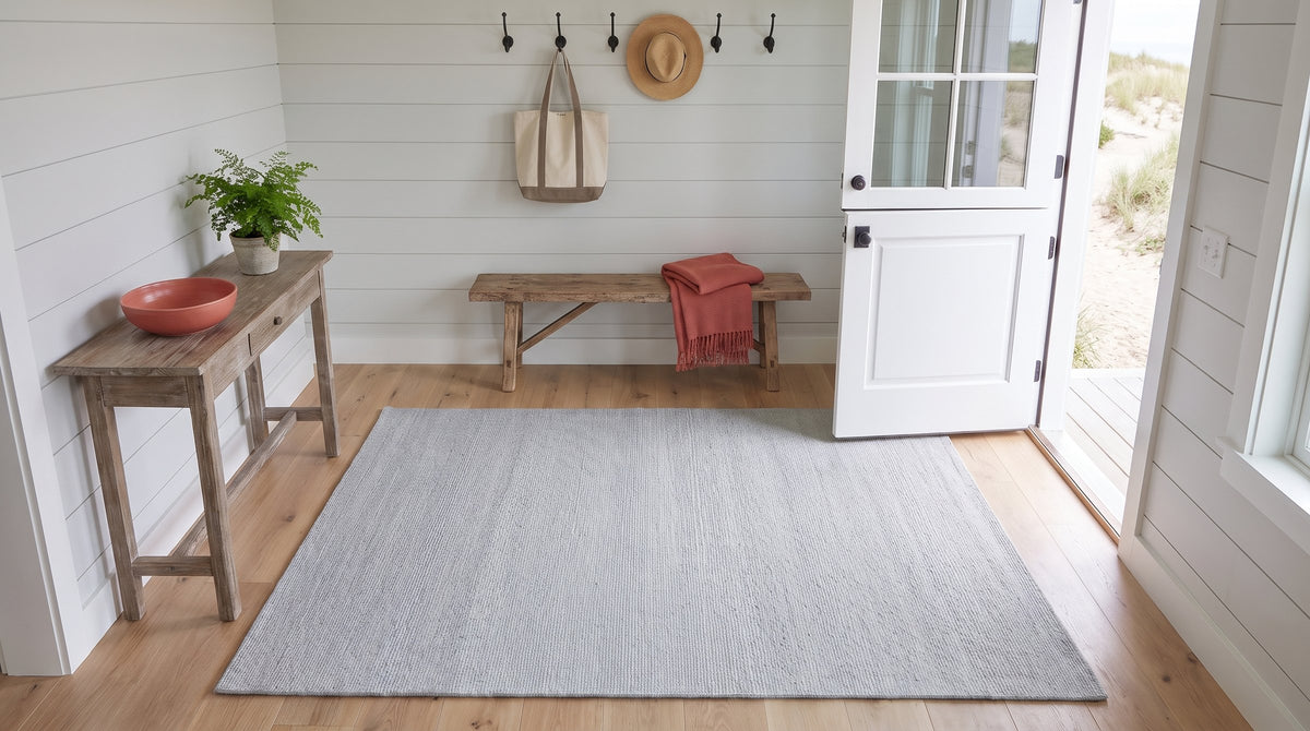 Fiona Rustic Ivory Flatweave Wool Rug in a entryway