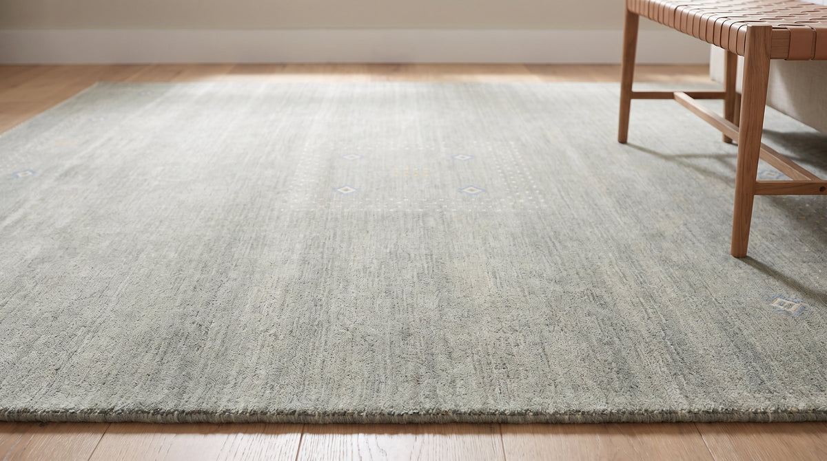 Freya Gabbeh Gray Handmade Wool Rug in a bedroom