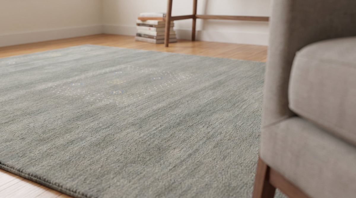 Freya Gabbeh Gray Handmade Wool Rug in a home office