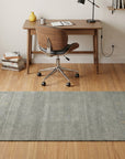 Freya Gabbeh Gray Handmade Wool Rug in a home office