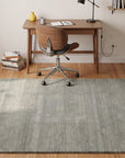 Freya Gabbeh Gray Handmade Wool Rug in a home office