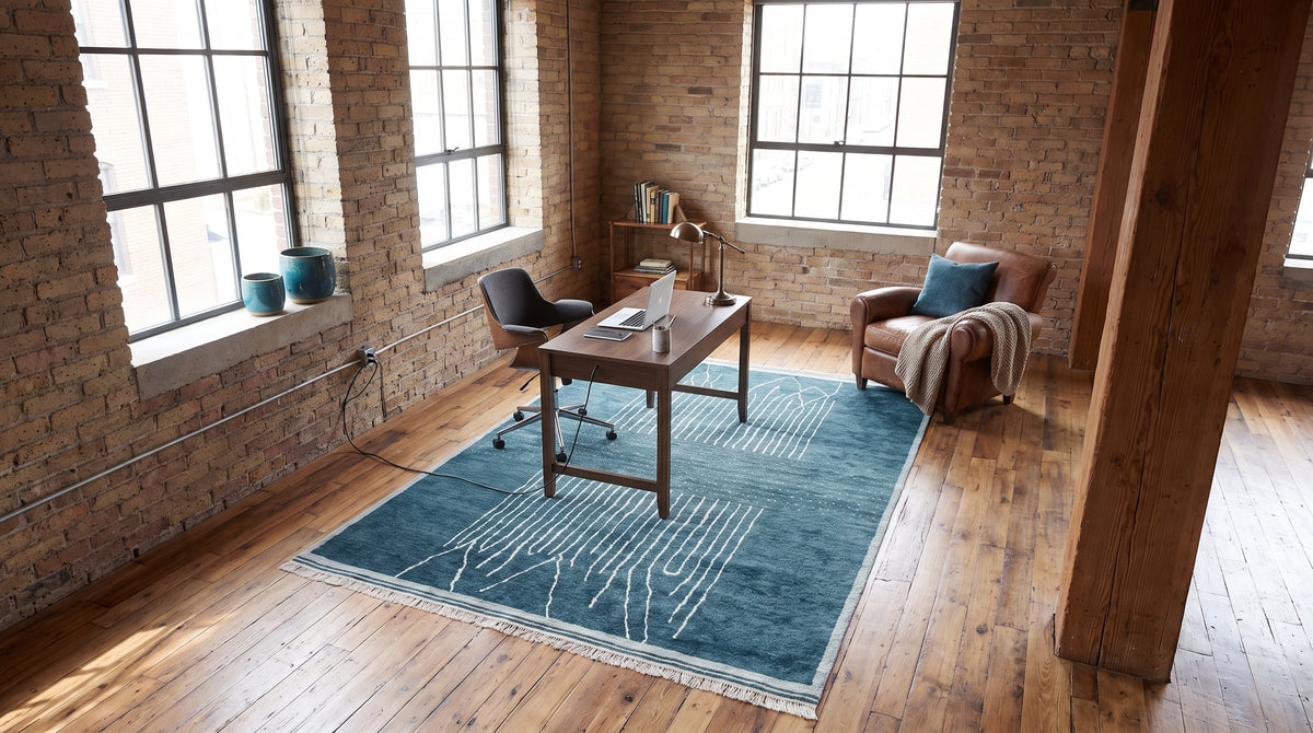 Freya Moroccan Green Hand Knotted Wool Rug in a home office