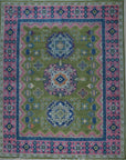 Green and fuchsia traditional Kazak hand-knotted wool rug, full overhead view