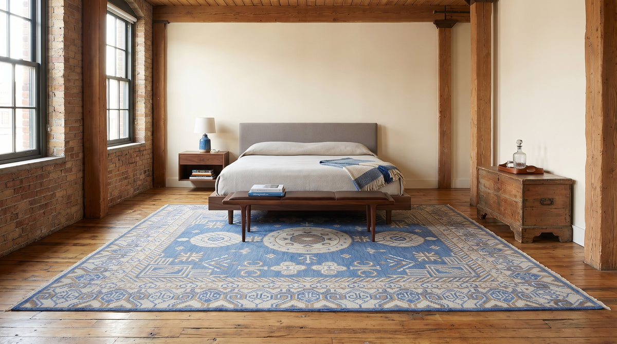 Handcrafted Traditional Blue Hand Knotted Wool Rug in a bedroom