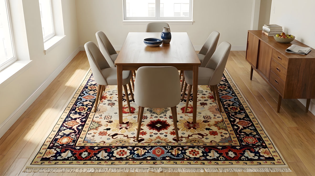 Handcrafted Xena Ivory Hand Knotted Wool Rug in a dining room