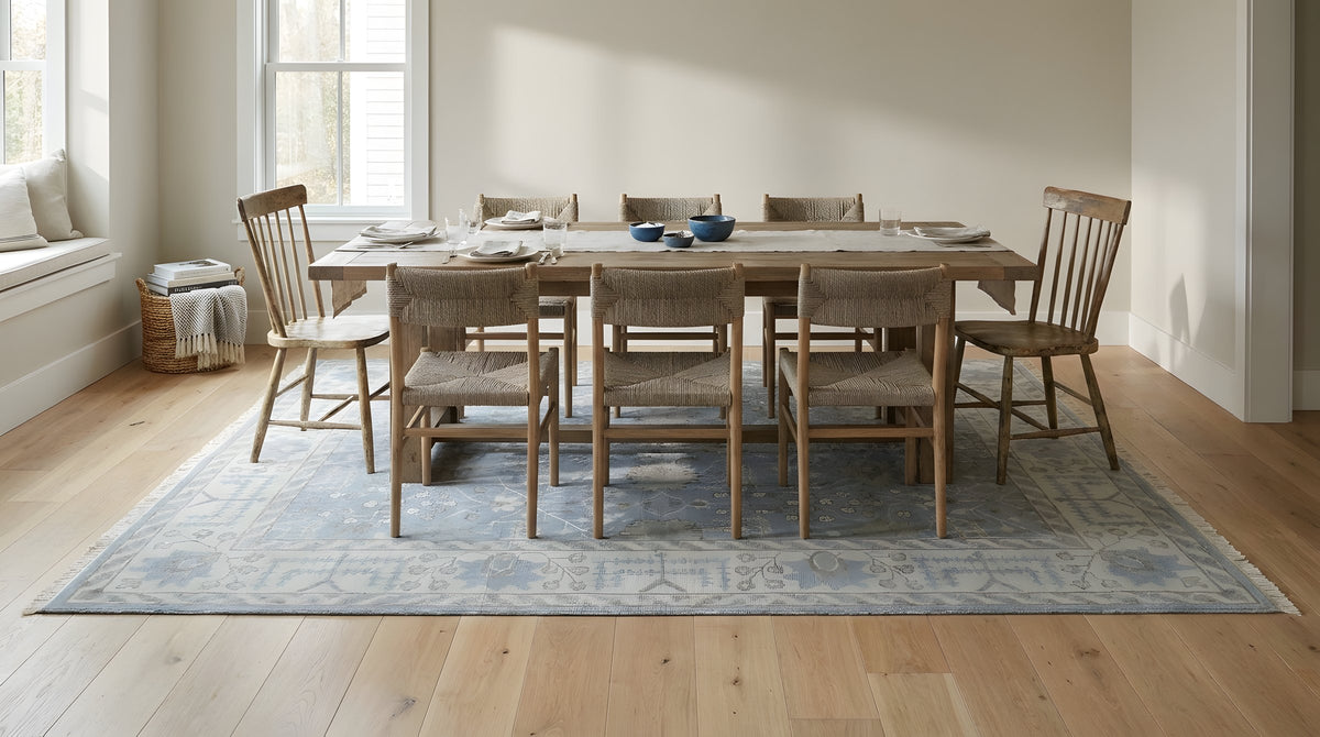 Harlow Traditional Blue and Gray Hand Knotted Wool Rug in a dining room