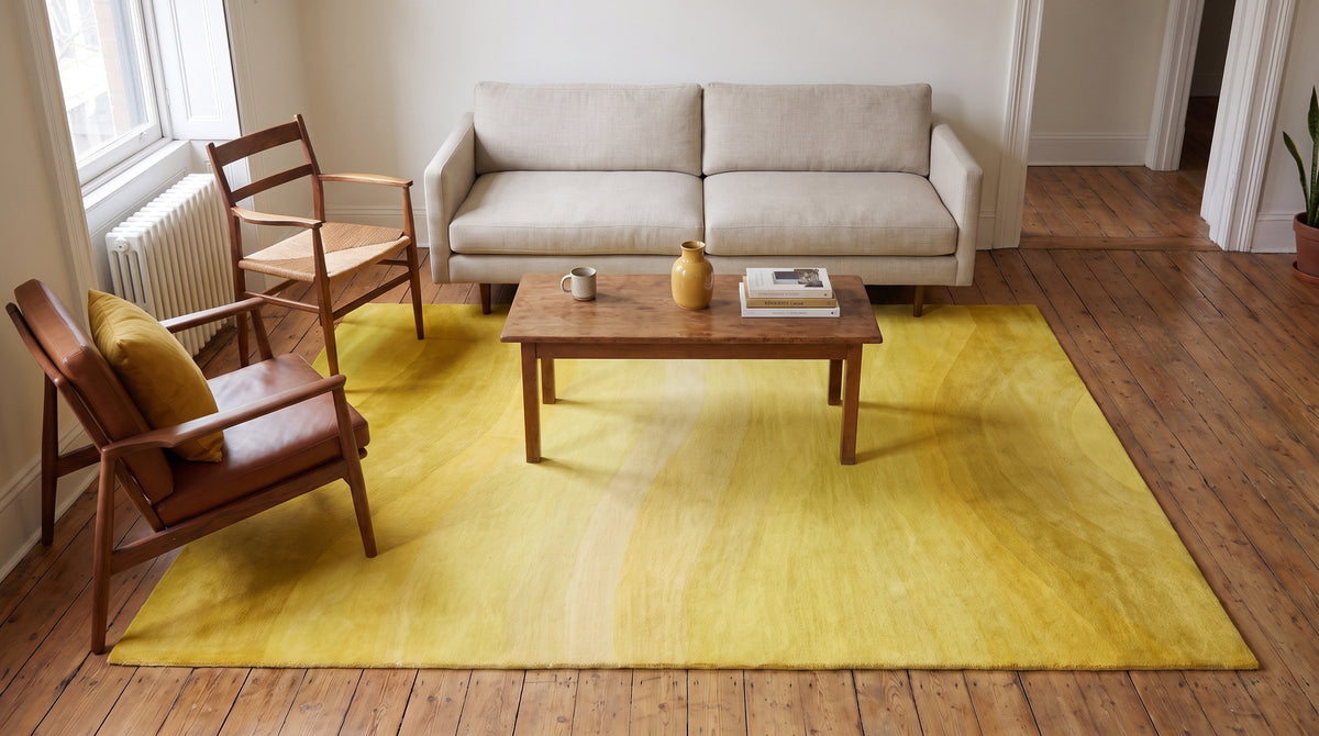 Inviting Ruby Yellow Hand Tufted Wool Rug in a living room