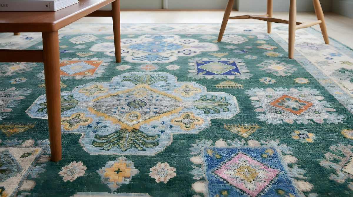 Isla Kazak Green Hand Knotted Wool Rug in a sunroom