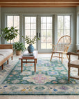 Isla Kazak Green Hand Knotted Wool Rug in a sunroom