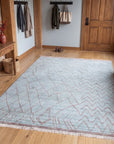 Isla Moroccan Blue Hand Knotted Wool Rug in a entryway