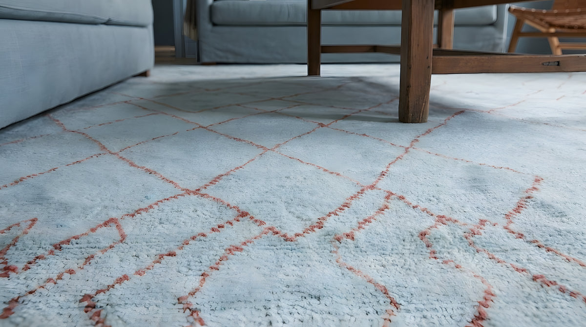 Isla Moroccan Blue Hand Knotted Wool Rug in a living room