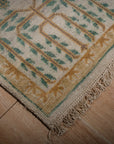 Ivory Oushak rug corner and border detail