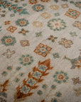 Ivory Oushak rug floral field close-up