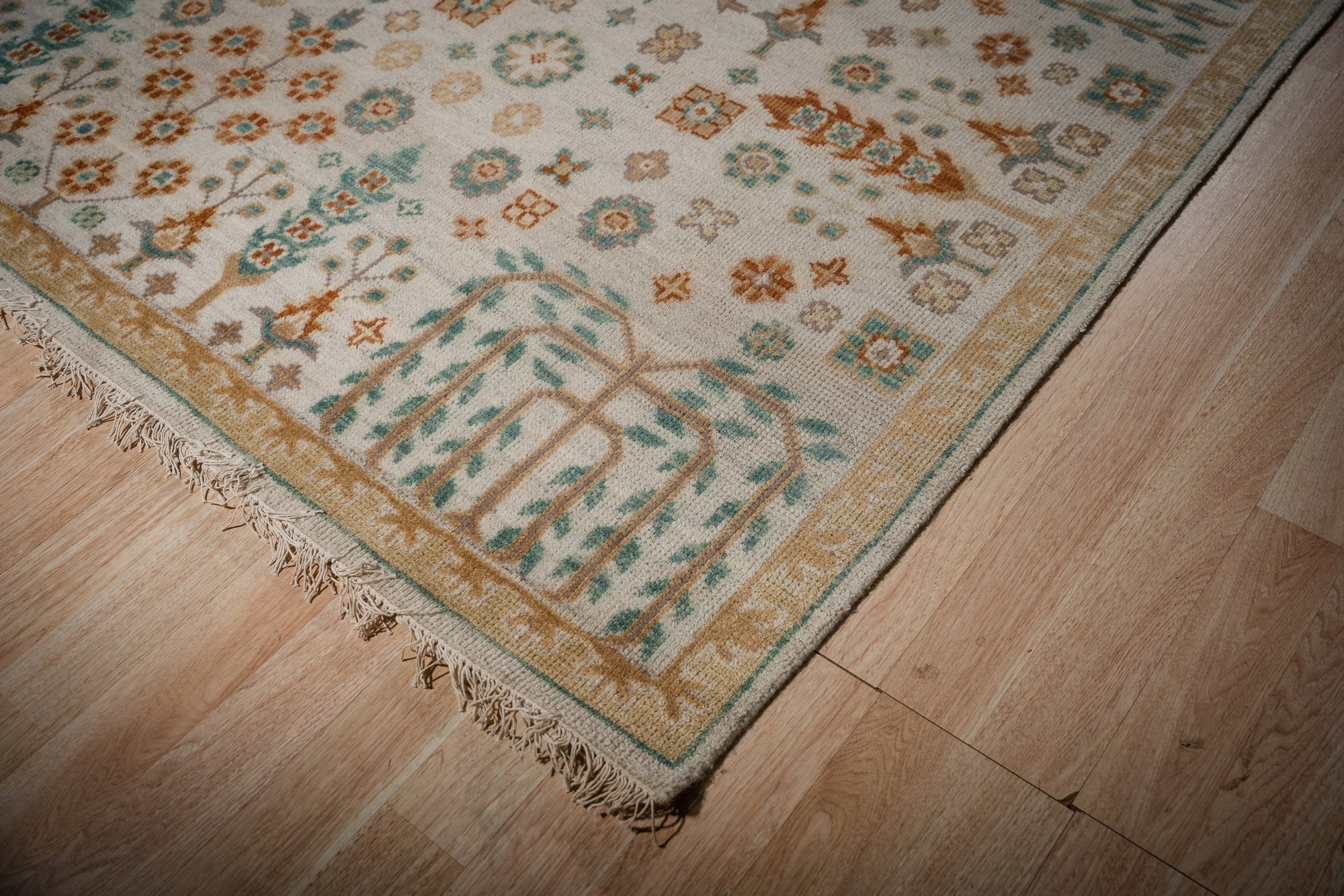 Ivory Oushak rug top-down allover field detail