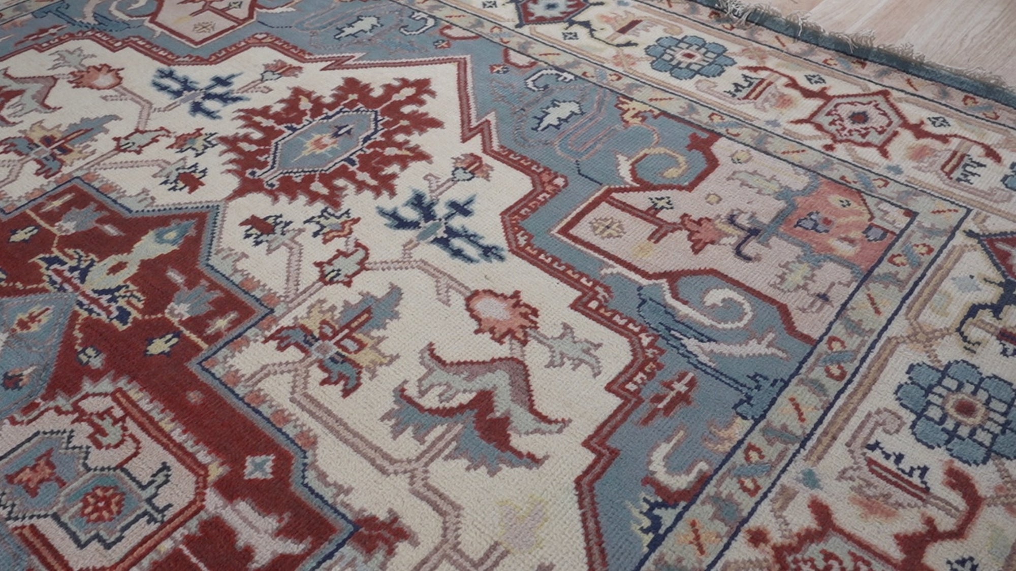 Ivory medallion rug angled field and medallion detail