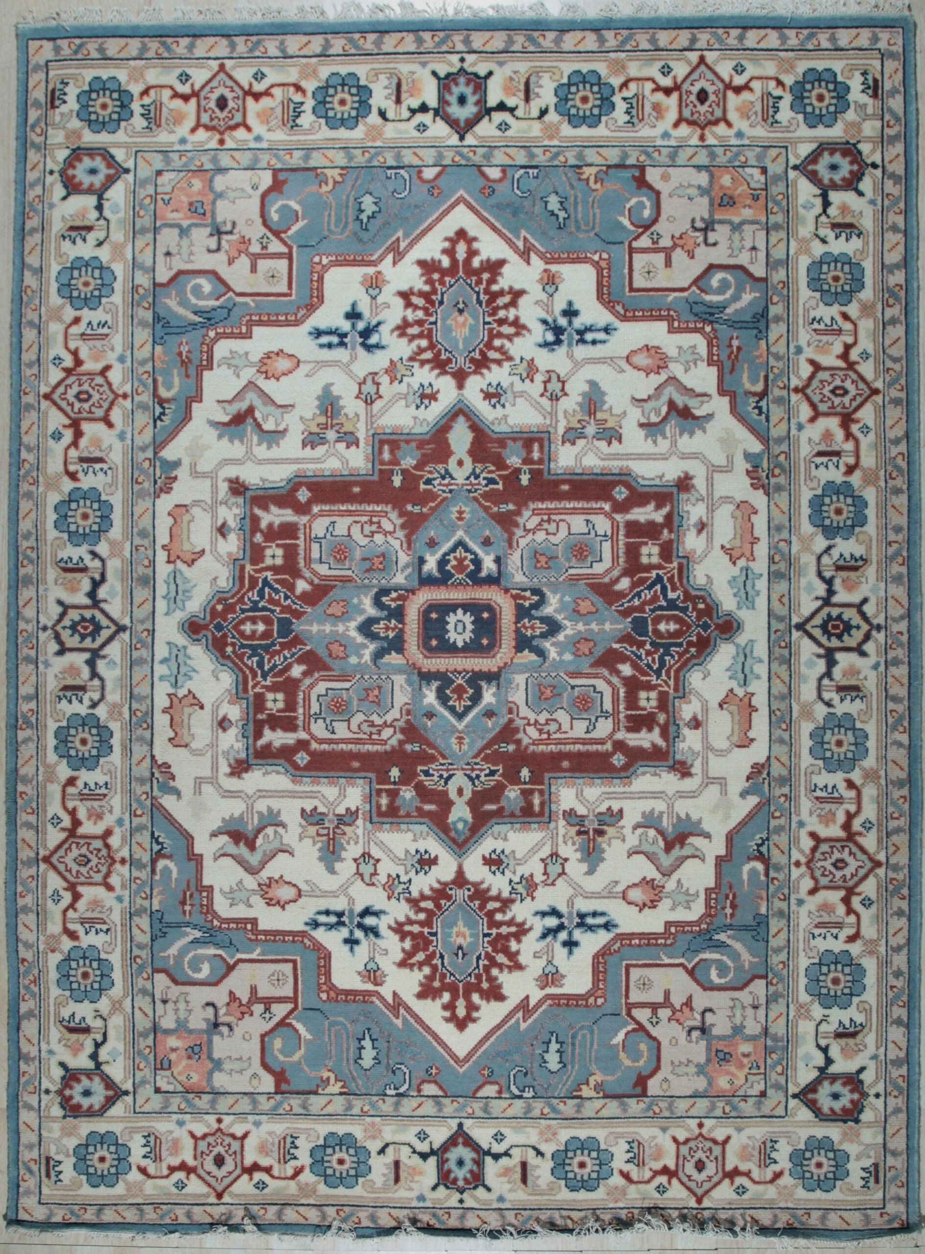 Ivory traditional medallion hand-knotted wool area rug, full overhead view