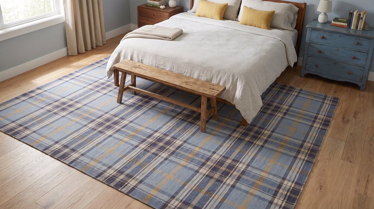 Dahlia Blue Flatweave Wool Rug in a bedroom
