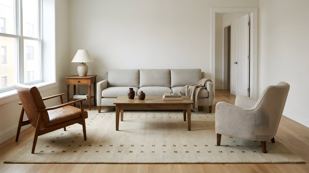 Jasmine Alluring Beige Handmade Wool Rug in a living room
